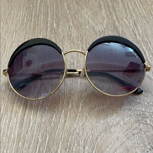 Miu Miu Black and Gold Round Sunglasses